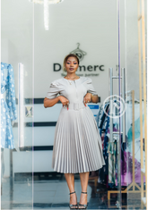 Elegant office dress with pleats